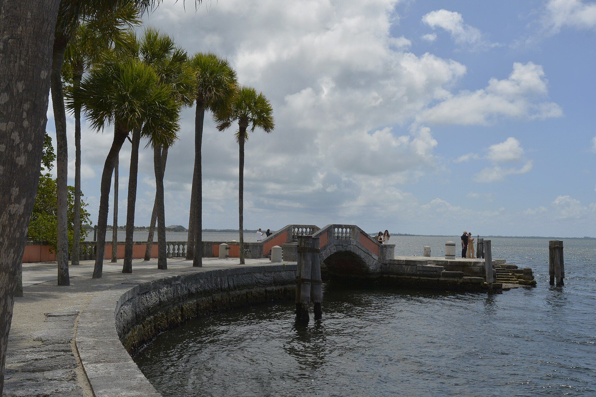 The curved seawall and stone barge in front of Vizcaya on Biscayne Bay