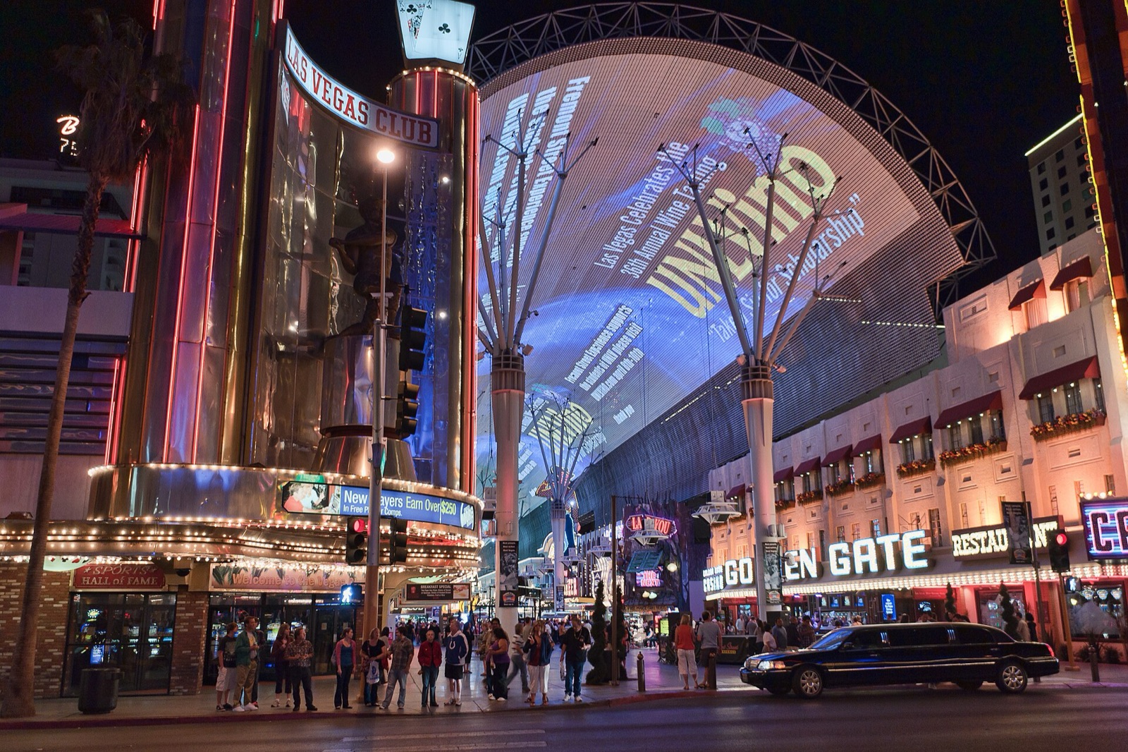 The Fremont Street Experience canopy lit up over the crowd