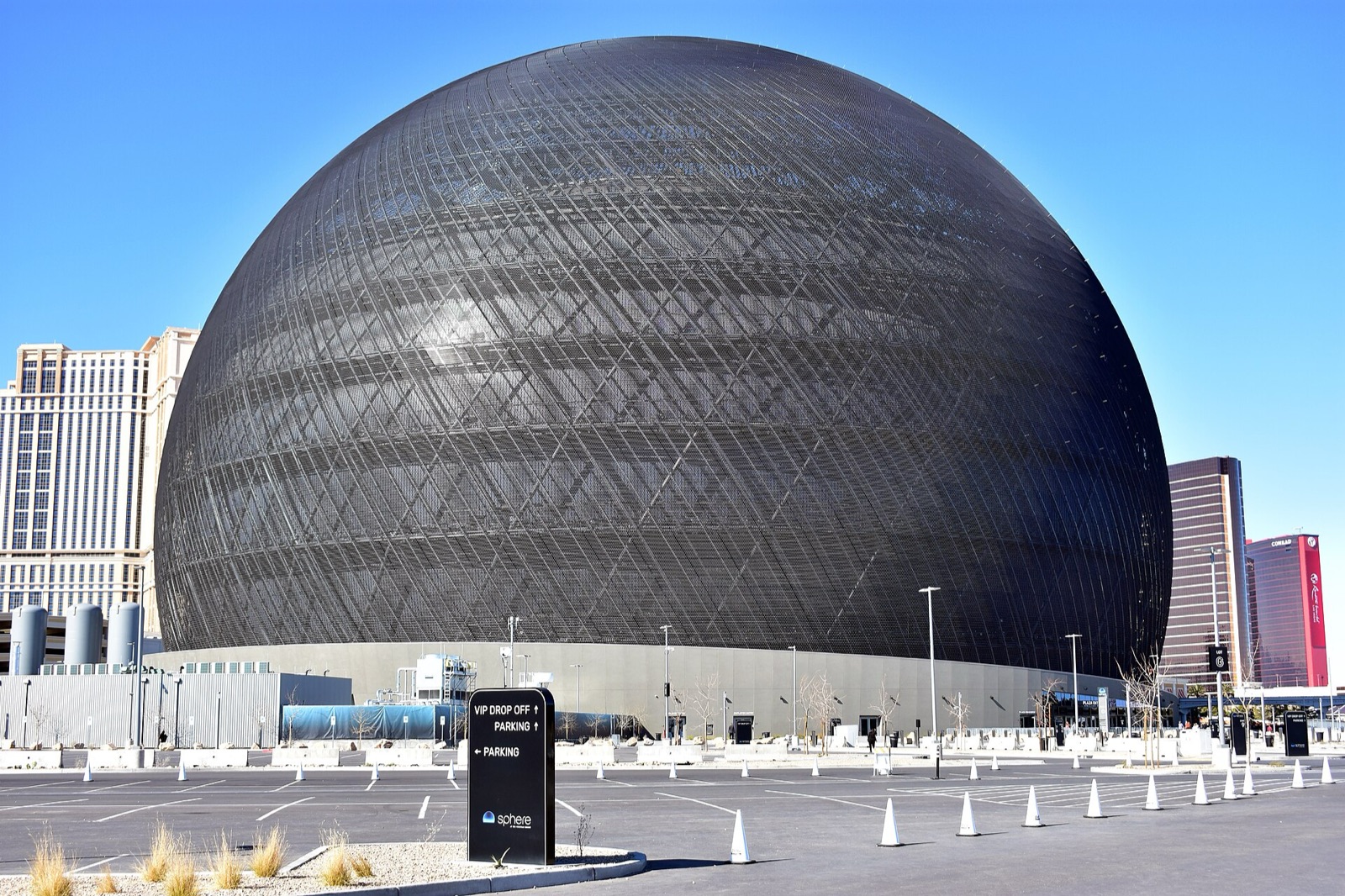 The Sphere in daylight, its curved LED exterior above the Strip